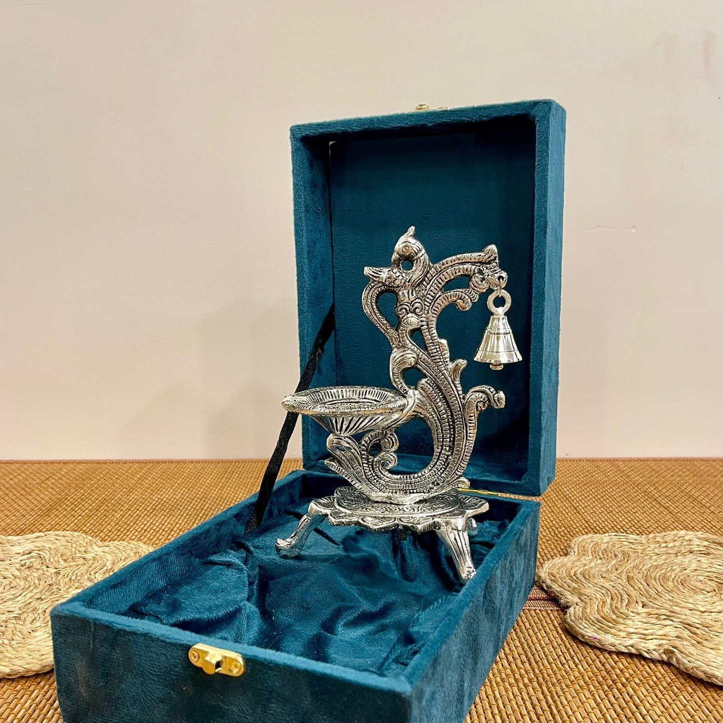 Silver Plated Peacock Shape Diya with Hanging Bell