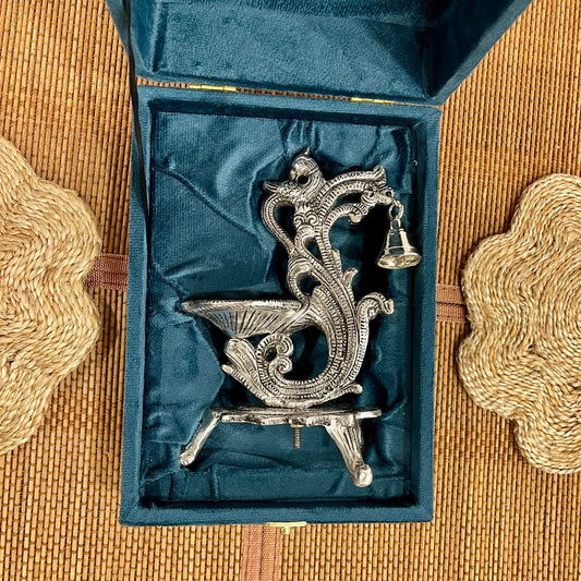 Silver Plated Peacock Shape Diya with Hanging Bell