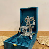 Silver Plated Peacock Shape Diya with Hanging Bell